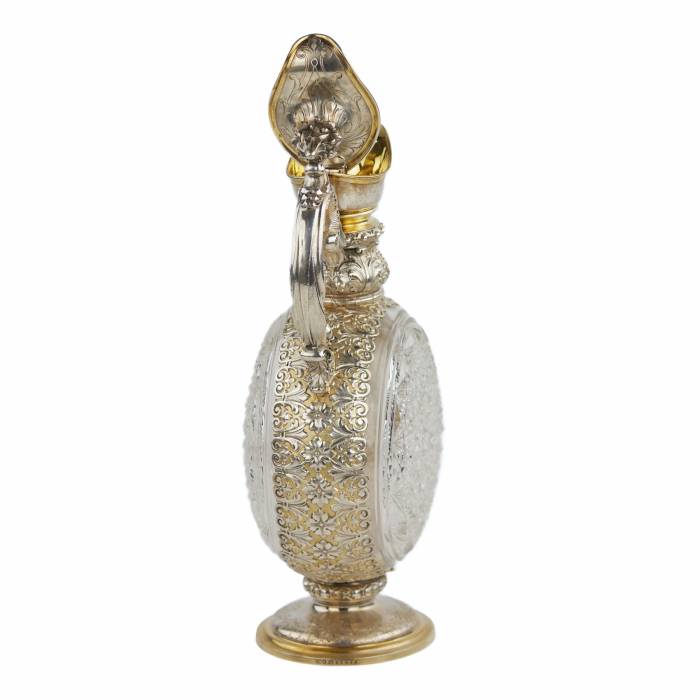 PAIR OF CUT CRYSTAL WINE EWERS WITH SILVER MOUNTS GERMANY, FIRST HALF OF THE 20TH CENTURY