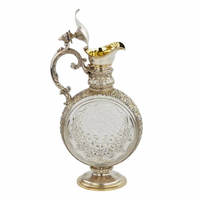 PAIR OF CUT CRYSTAL WINE EWERS WITH SILVER MOUNTS GERMANY, FIRST HALF OF THE 20TH CENTURY