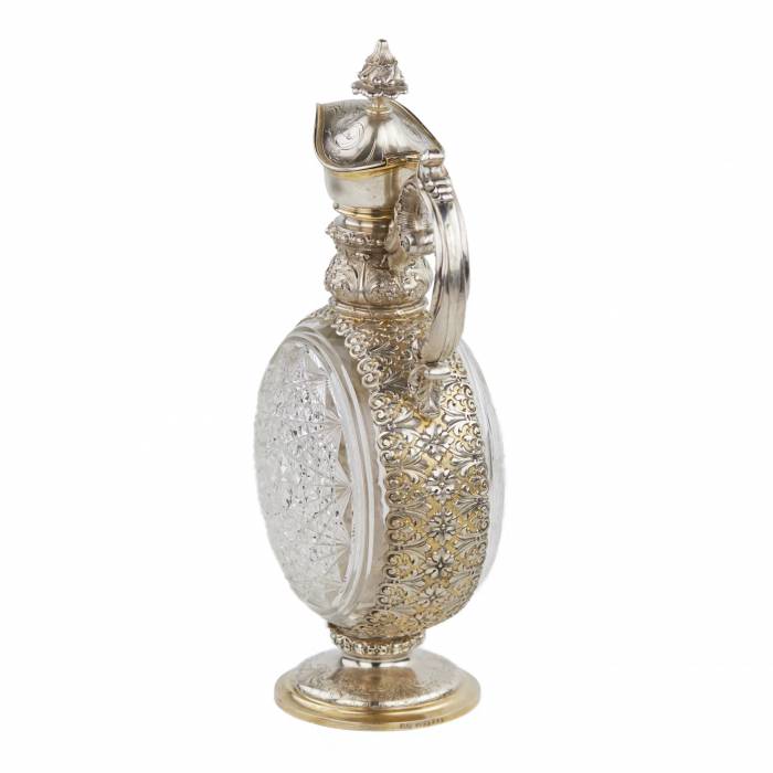 PAIR OF CUT CRYSTAL WINE EWERS WITH SILVER MOUNTS GERMANY, FIRST HALF OF THE 20TH CENTURY