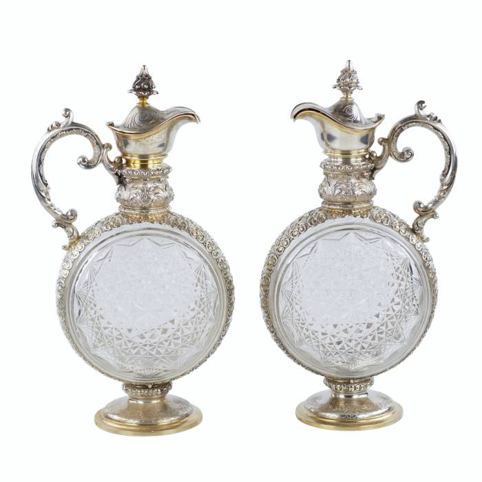 PAIR OF CUT CRYSTAL WINE EWERS WITH SILVER MOUNTS GERMANY, FIRST HALF OF THE 20TH CENTURY