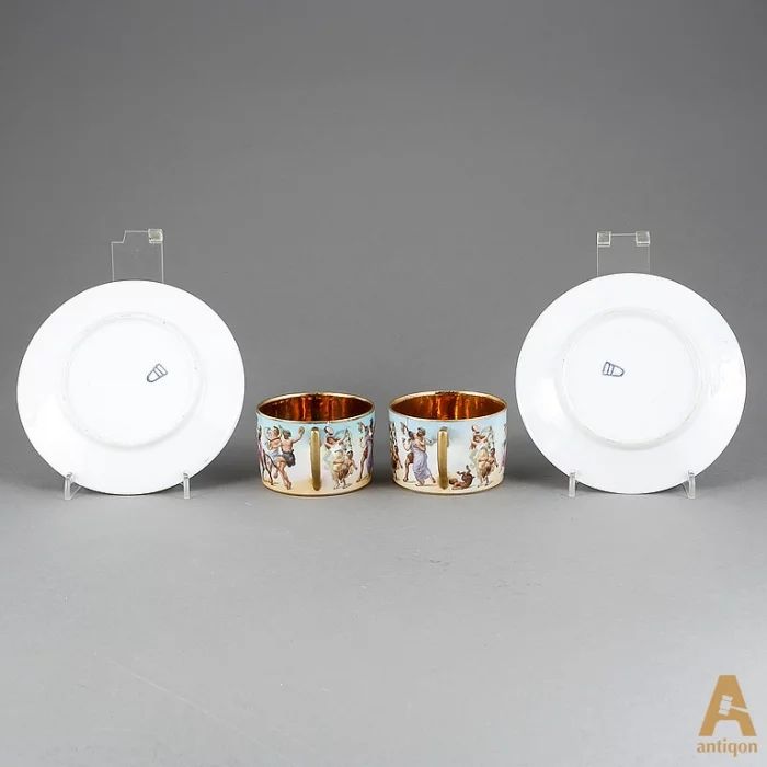 A couple of unique decorative cups and saucers