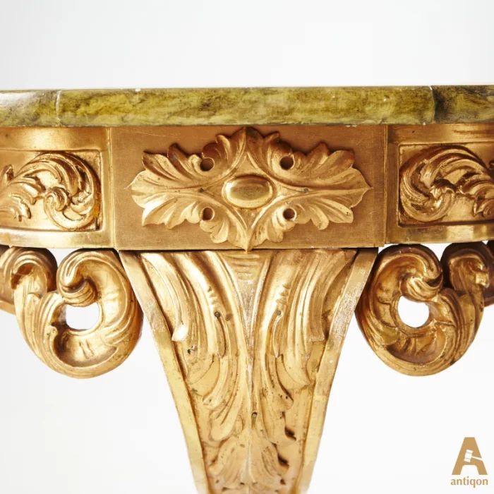 The  gilded console