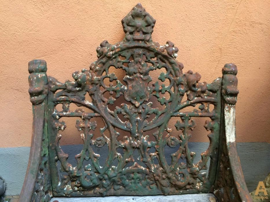 A couple of cast-iron chairs for the garden