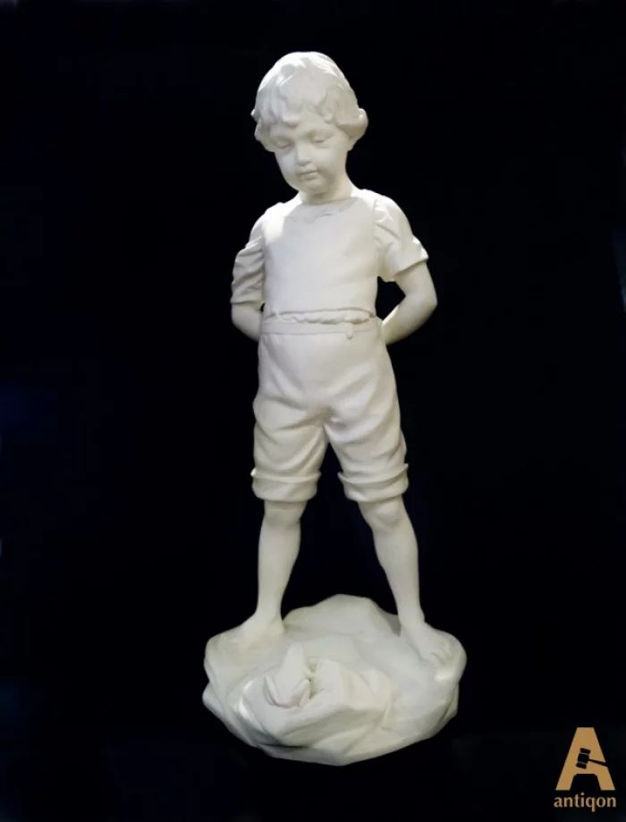 Porcelain figure "Boy with a frog"