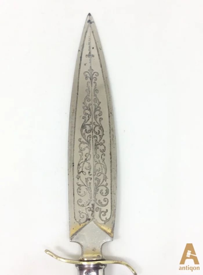 Silver knife for letters.