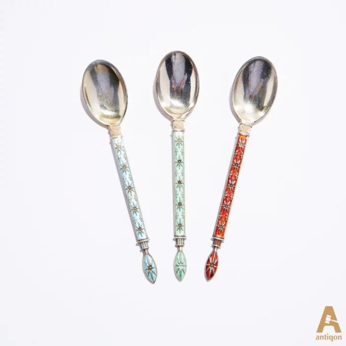 A set of 6 silver spoons with multi-colored enamel in a gift case