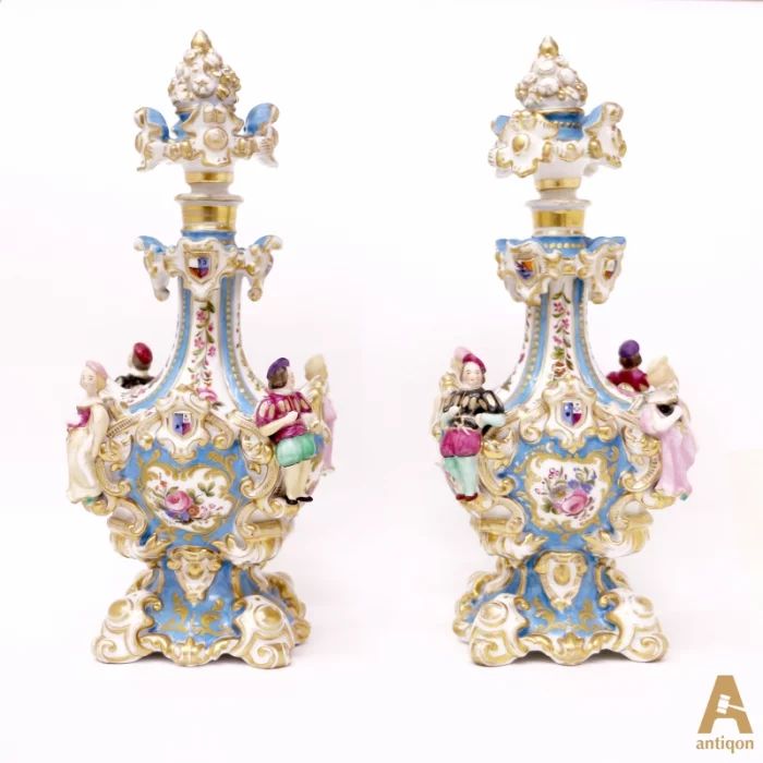 A pair of perfume flacon