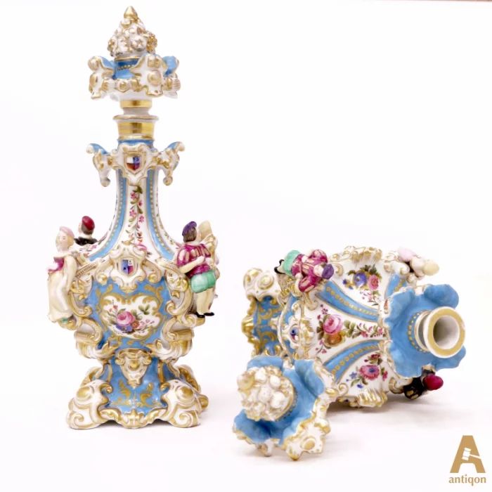 A pair of perfume flacon