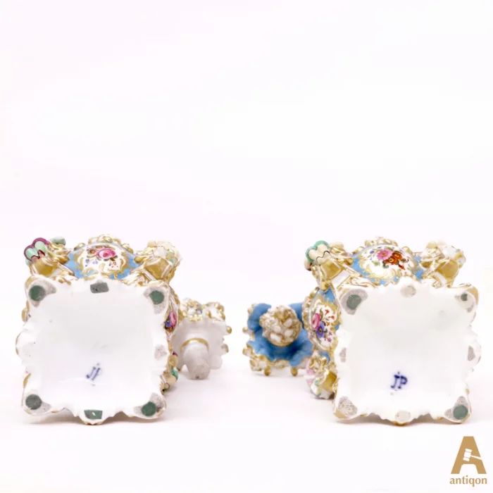 A pair of perfume flacon