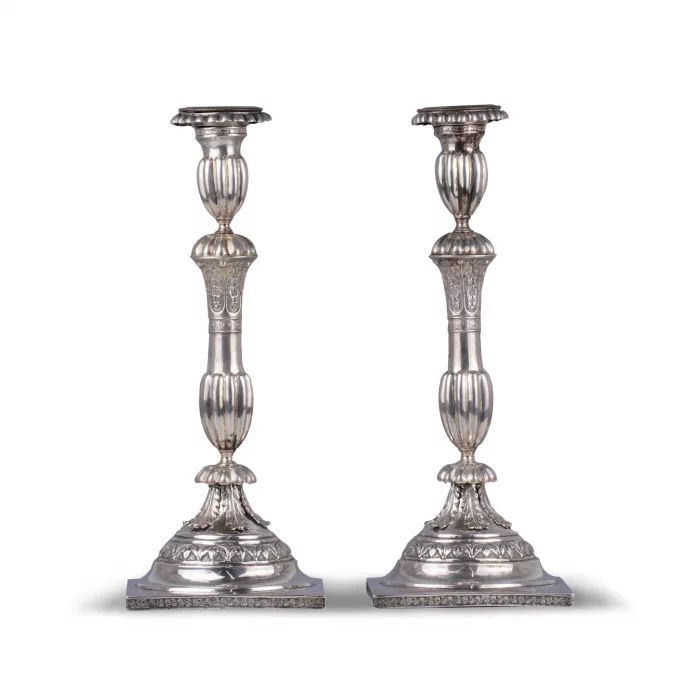 A pair of slender silver candlesticks. Russia 19th century. 