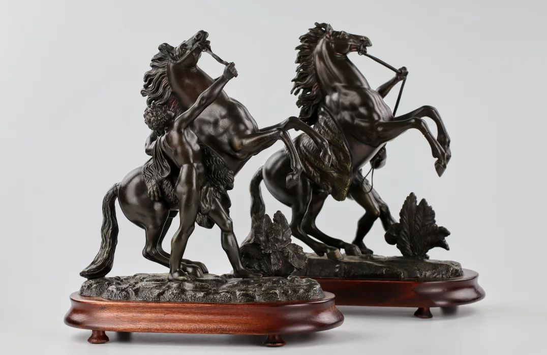 Pair of bronzed Marley riders of the late 19th century 