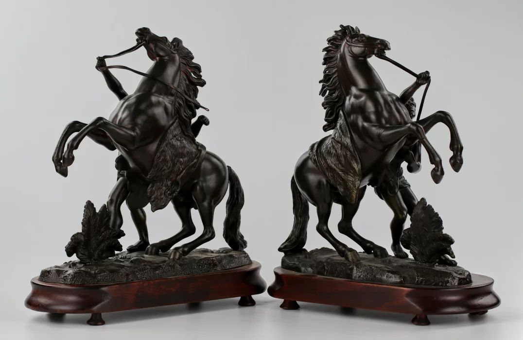 Pair of bronzed Marley riders of the late 19th century 