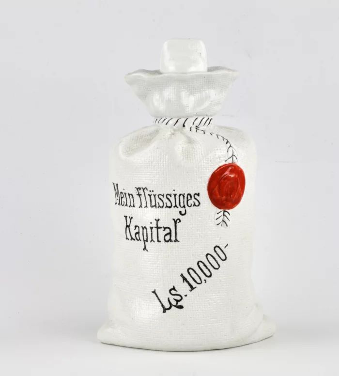 Une bouteille en porcelaine avec le slogan "Mein flüssiges Kapital" 