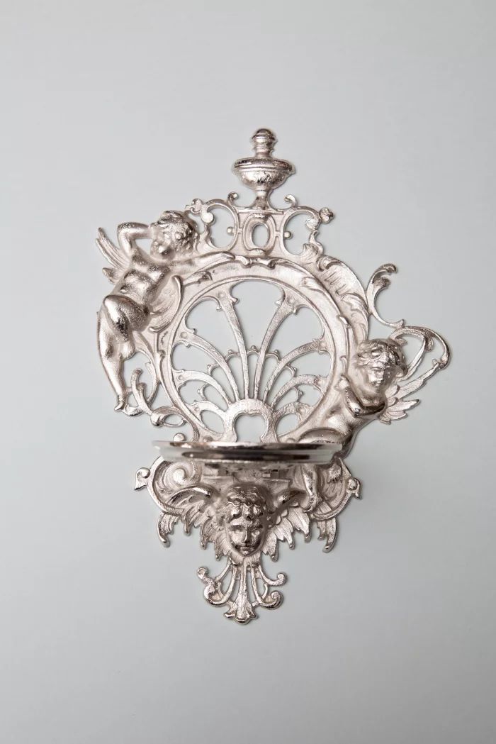Molded shelf with angels
