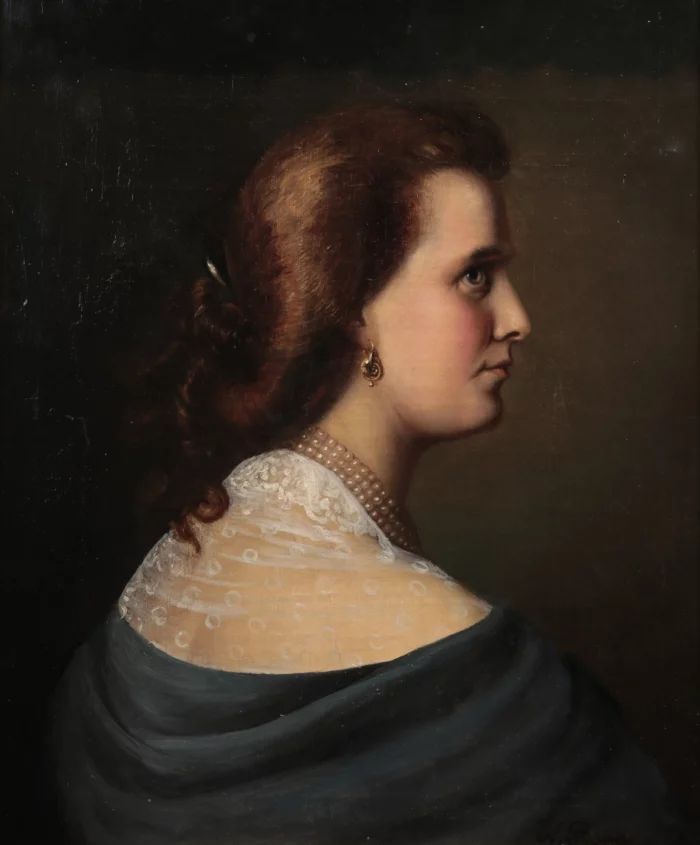 Portrait of a woman in profile.