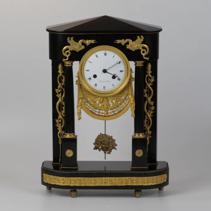 Mantel clock of late French Empire style.