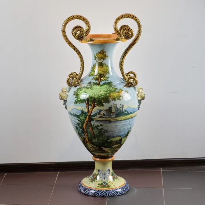 Majolica floor vase with snakes.