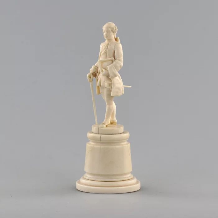 Ivory figure of a gentleman in a cocked hat.