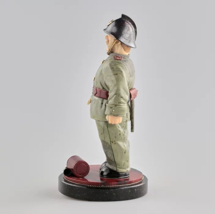 Stone-cut figure Fireman. 