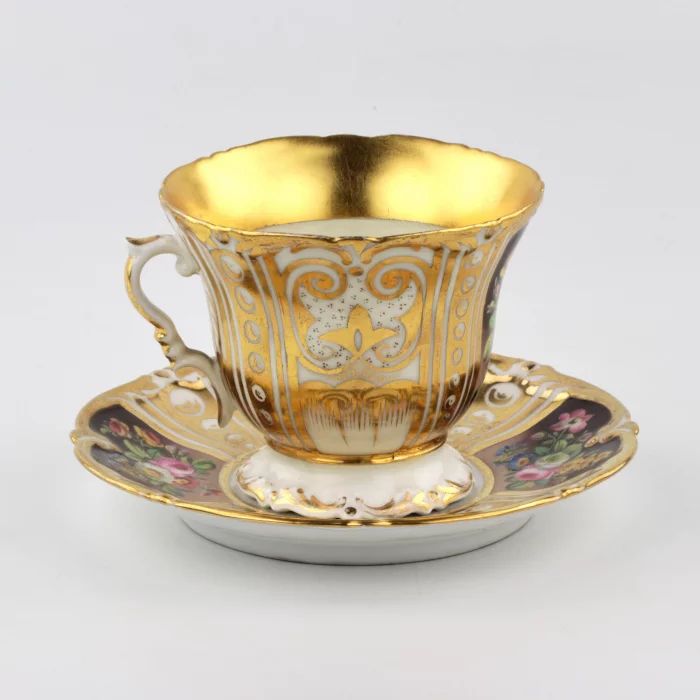 Large porcelain cup and saucer. 