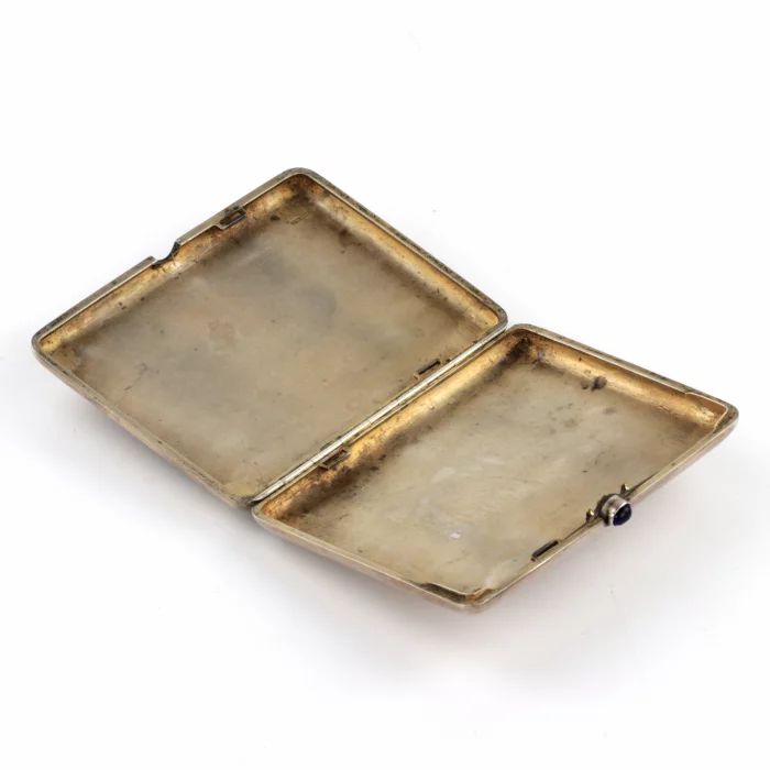 Russian silver cigarette case with an erotic scene. 