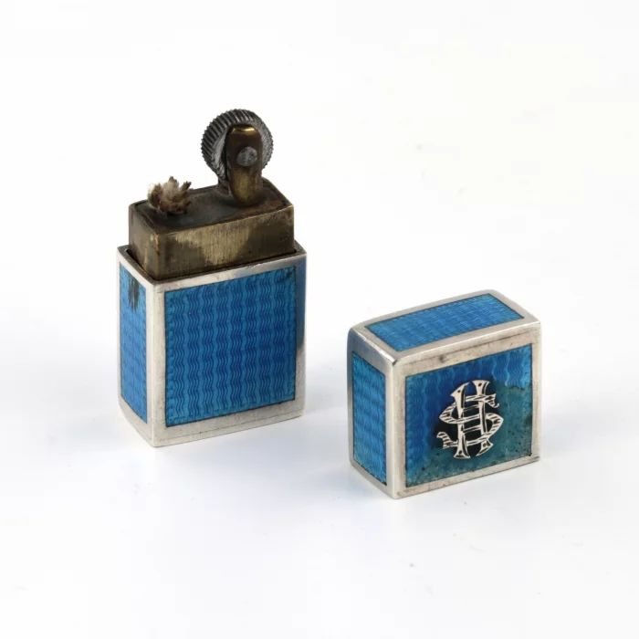 Miniature ladies lighter made of silver with guilloche enamel. 