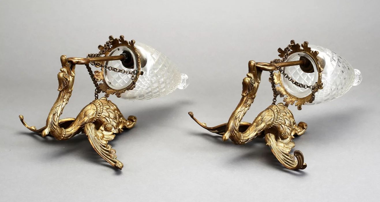 Pair of gilded bronze sconces with shades, first third of the 19th century. 
