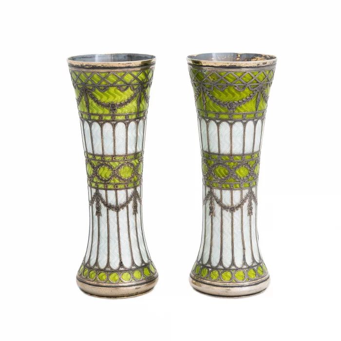 A pair of vases-buds of gilded silver and guilloche enamel, early 20th century. 