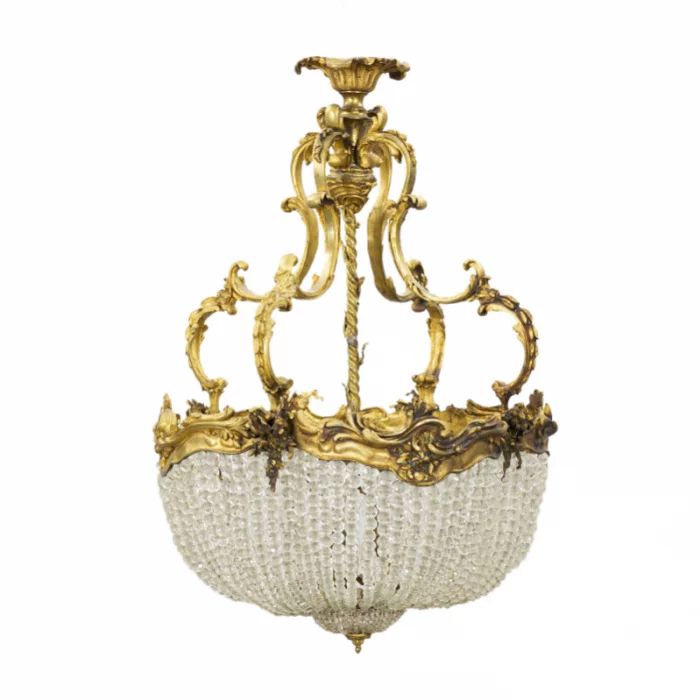 Lustre en bronze dore pour cinq bougies avec monture en cristal de style Napoleon III. 