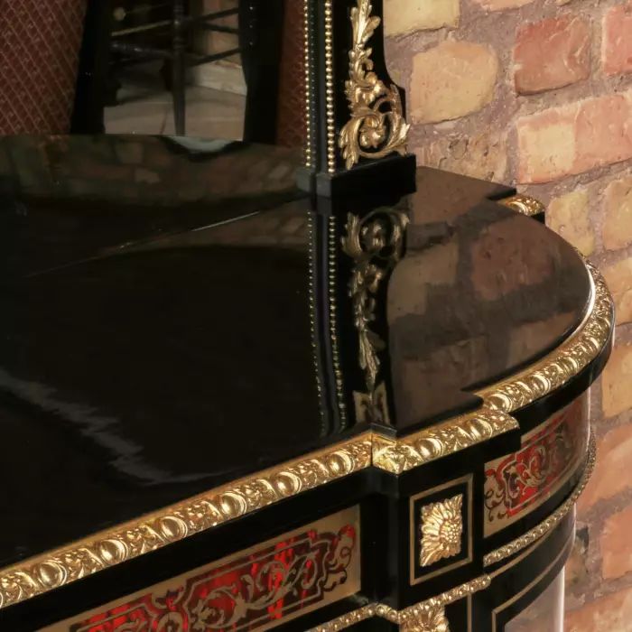 Luxurious chest of drawers with a mirror in Boulle style. 