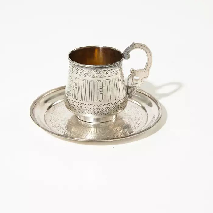 Russian silver cup and saucer. 
