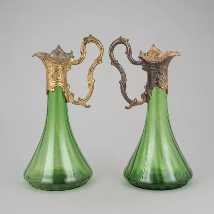 A pair of Art Nouveau jugs. 