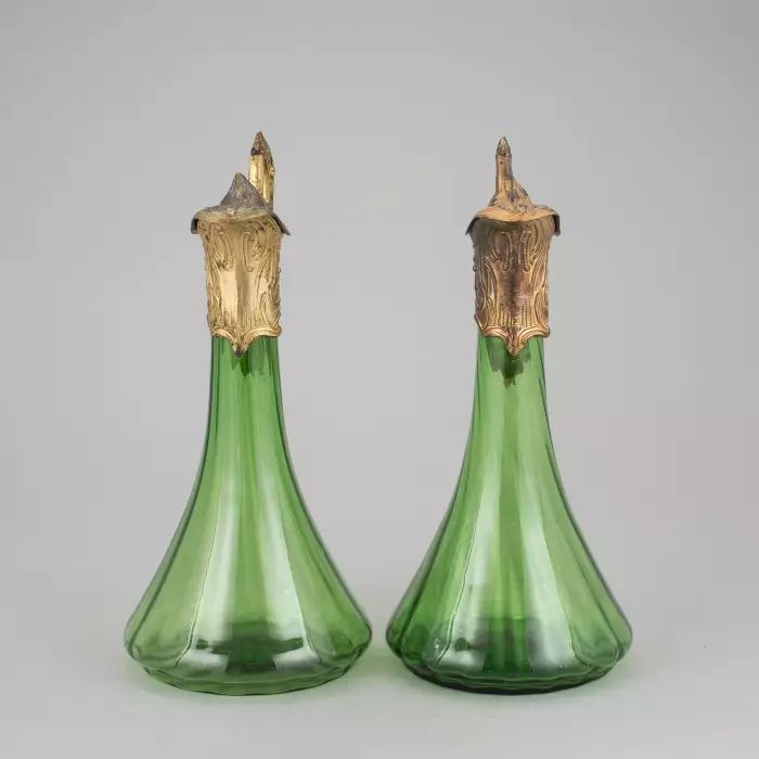 A pair of Art Nouveau jugs. 