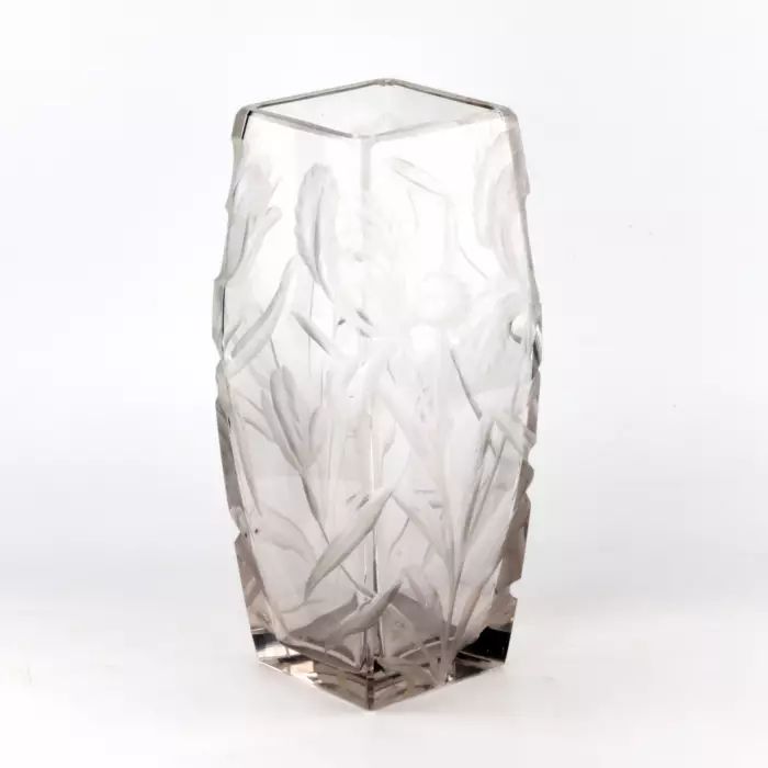 Large, heavy, crystal vase with luxurious irises. 