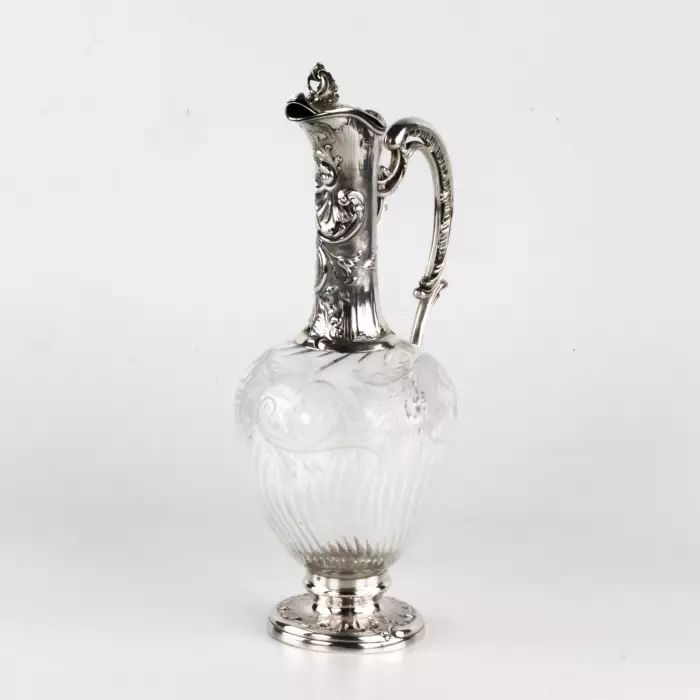 Charming French wine jug made of glass with silver. 