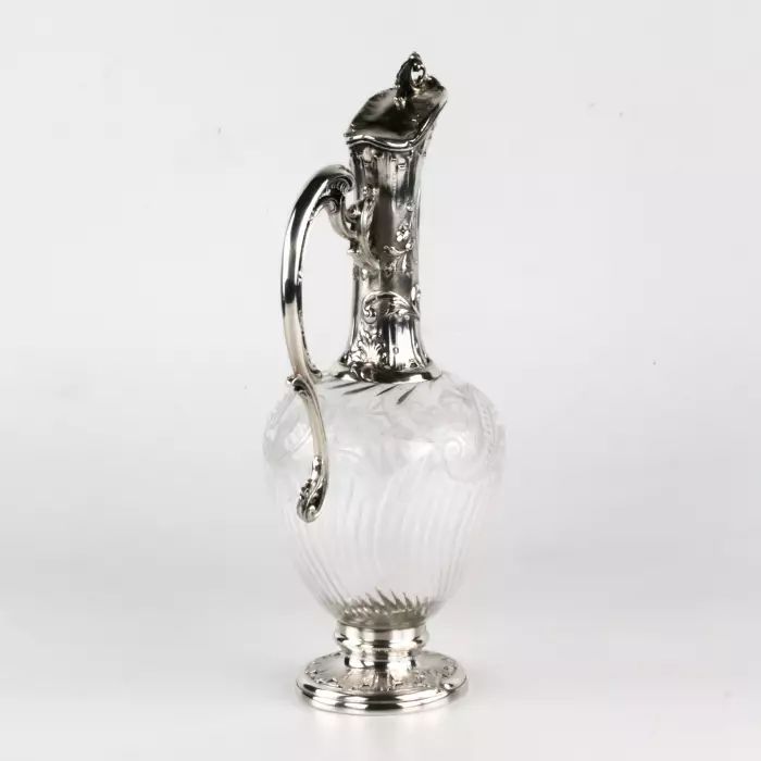 Charming French wine jug made of glass with silver. 