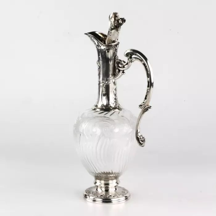 Charming French wine jug made of glass with silver. 