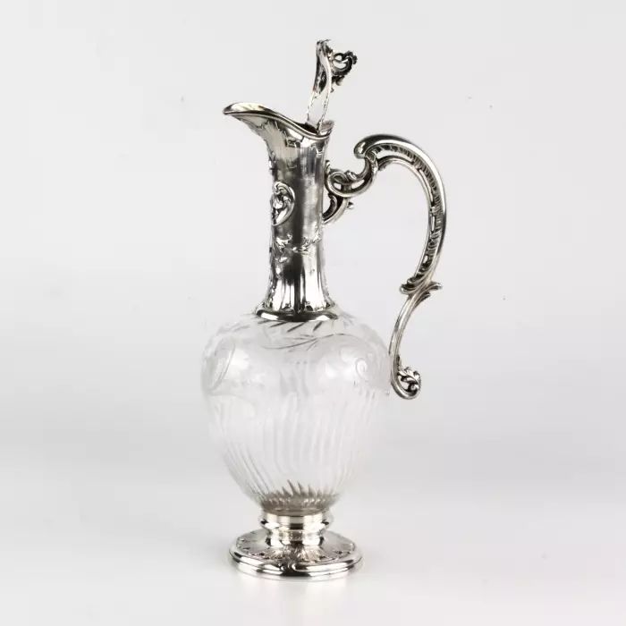 Charming French wine jug made of glass with silver. 