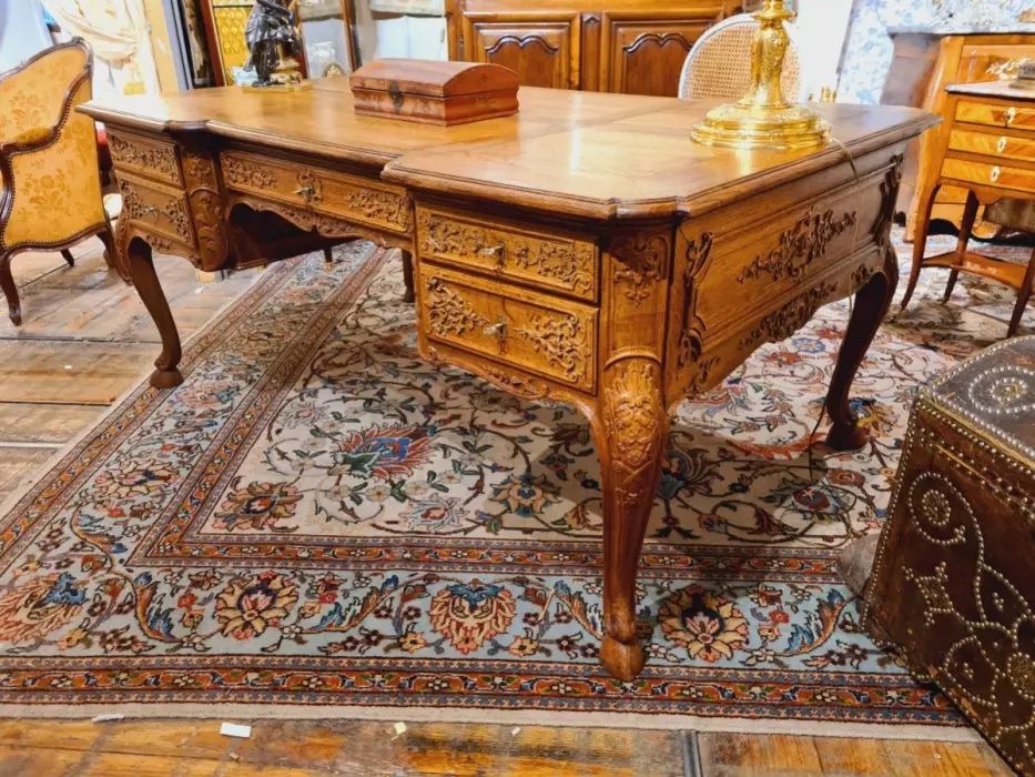 Regency style office table, richly carved. 