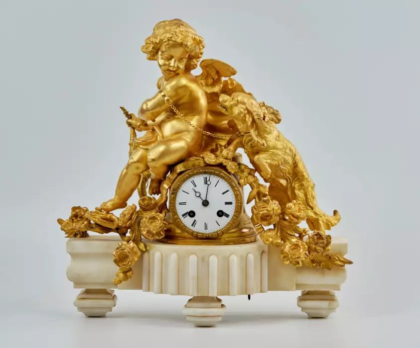 Phillipe Mourey. Mantel clock "Putti with a dog". 