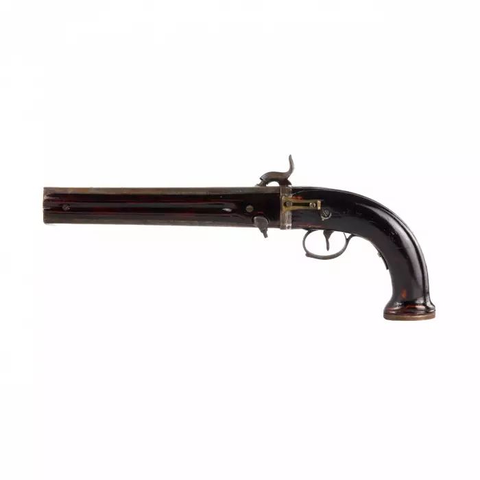Large double-barreled pistol with rolling barrels. 