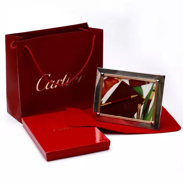 Silver photo frame. CARTIER. 