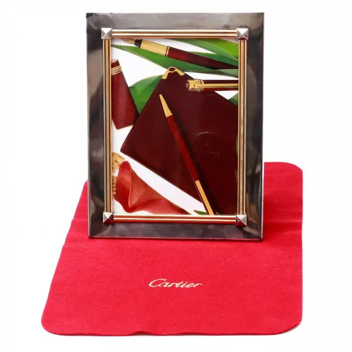 Silver photo frame. CARTIER. 