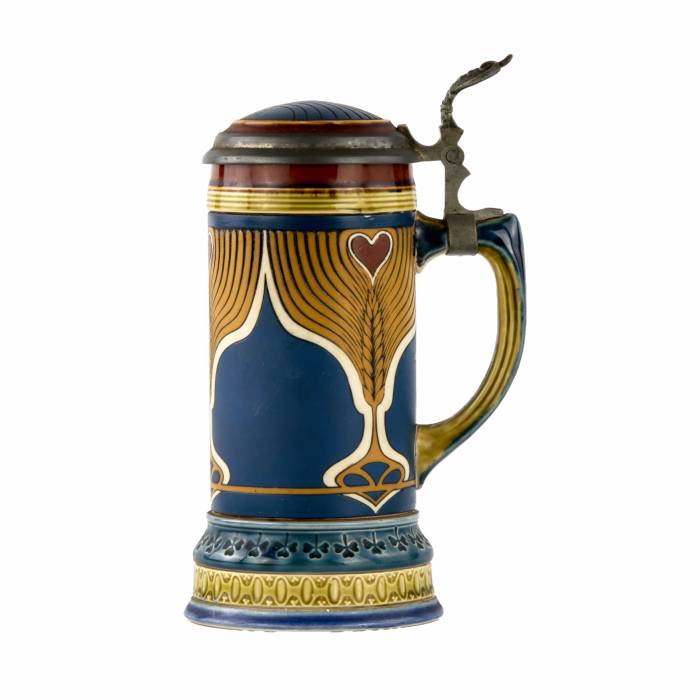 Chope à bière en ceramique peinte Metlach. 