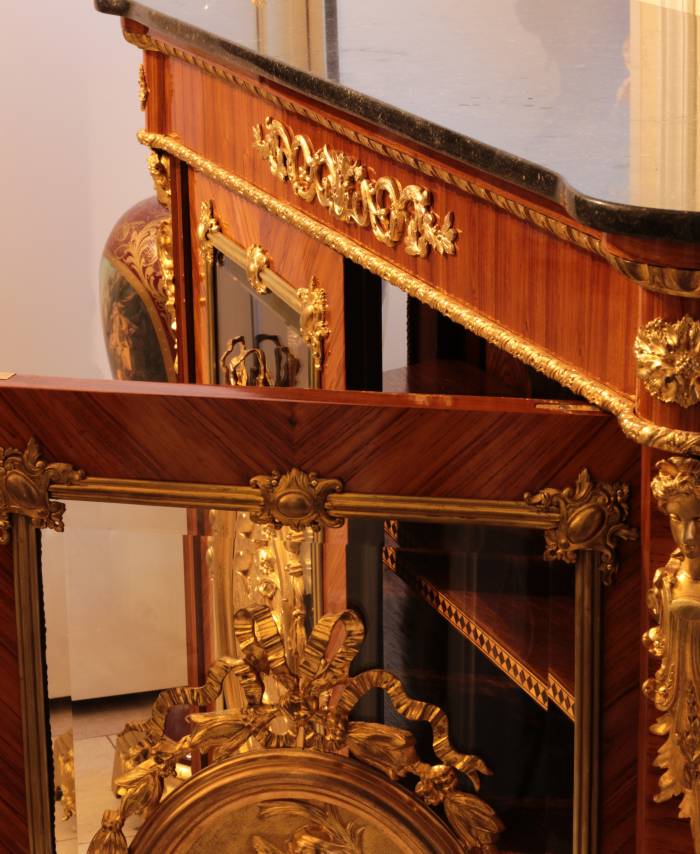 Large chest of drawers in Louis XVI style. The end of the 19th century.