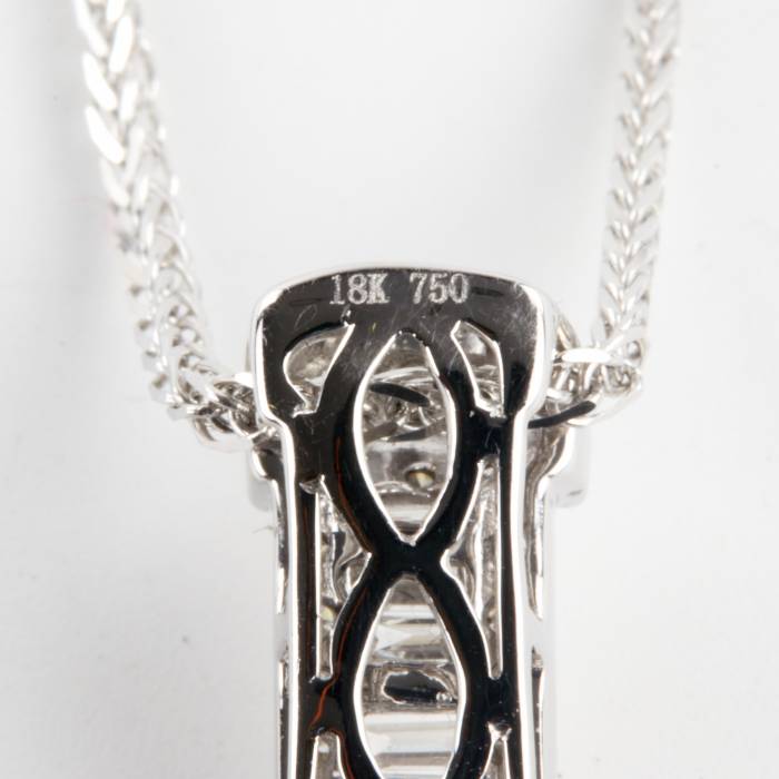 Gold necklace with diamond cross pendant. 