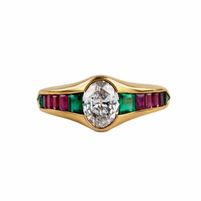 Gold ring, 18 carats with diamond, emeralds and rubies. 