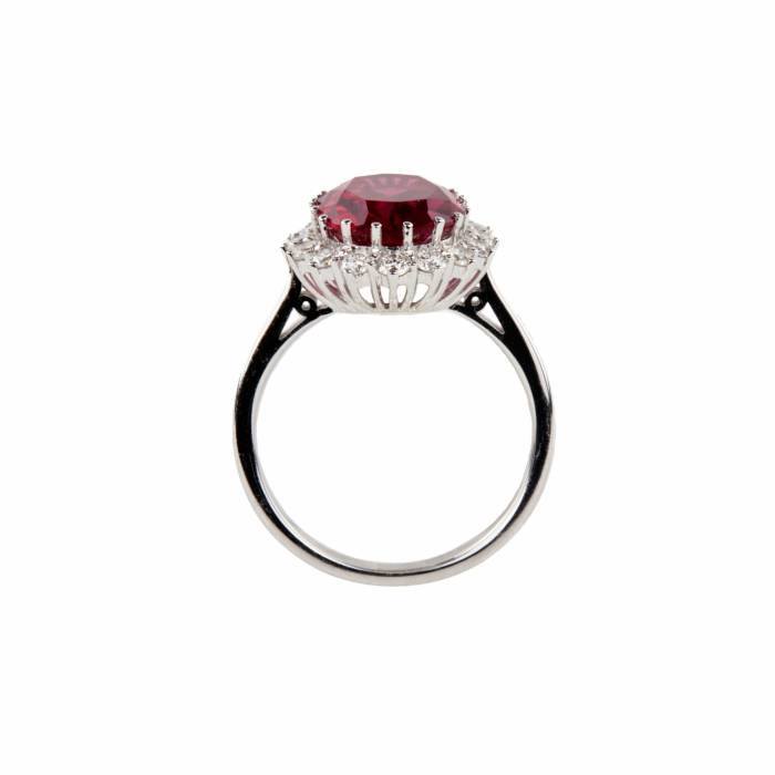 White gold ring with synthetic ruby and diamonds. 