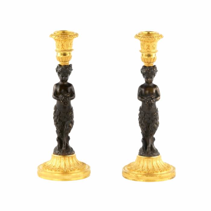 Pair of bronze, French candlesticks, in the form of fauns, mid-19th century. 