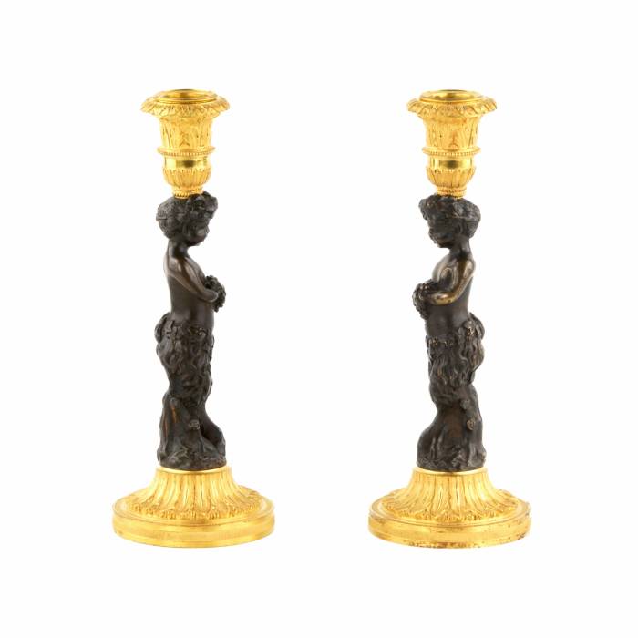 Pair of bronze, French candlesticks, in the form of fauns, mid-19th century. 